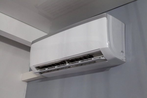 ductless system installed in the bedroom wall