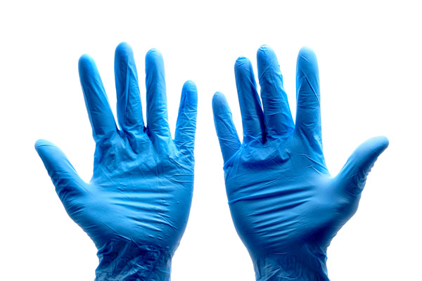 image of latex gloves used to remove dead animal from hvac system