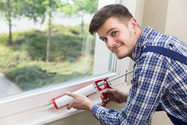 https://www.skylandsenergy.com/wp-content/uploads/2021/05/image-of-an-hvac-contractor-sealing-air-leaks-in-a-home.jpg