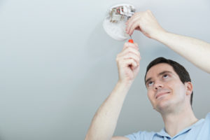 HVAC Contractor Installing Carbon Monoxide Detector