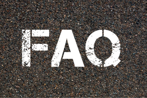 FAQ spray painted on concrete depicting How to Size a Standby Generator frequently asked questions
