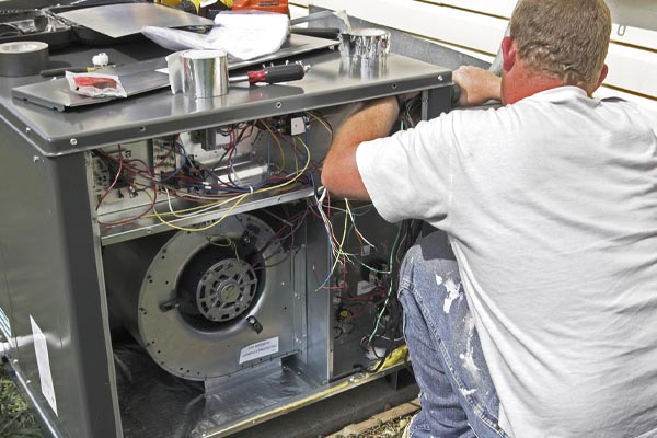 image of an air conditioner repair by an hvac contractor