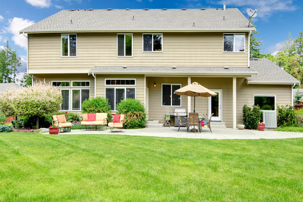 image of home with air conditioner depicting clearance around air conditioning unit