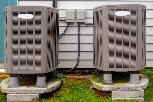 image of two air conditioner condensers with sufficient clearance