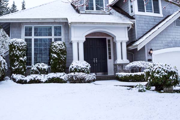 image of a two story house depicting efficient home heating