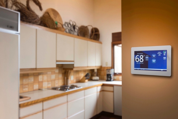 programmable thermostat near the kitchen