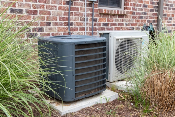 grass blocking air conditioner condenser