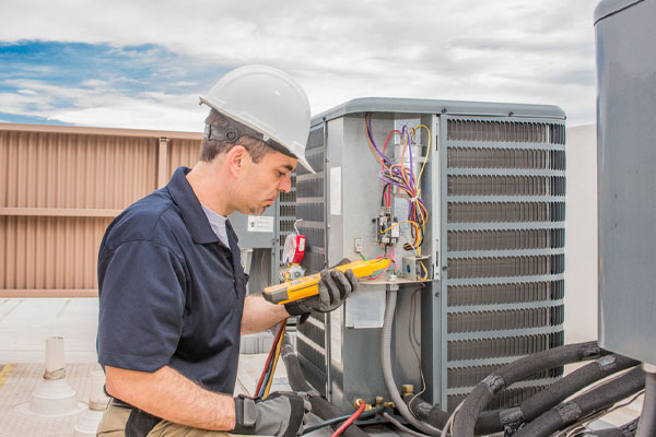 image of an ac capacitor repair or replacement by an hvac contractor