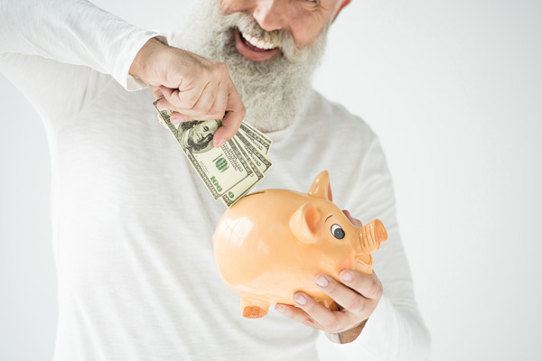 image of a homeowner saving money from boiler maintenance