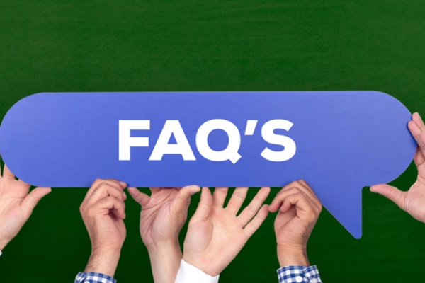 Hands holding speech bubble that says FAQS depicting questions about Emergency HVAC Services