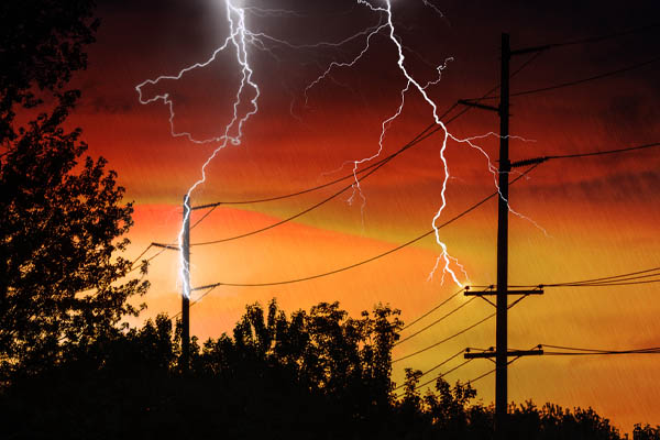 image of lightning striking electrical tower and surge