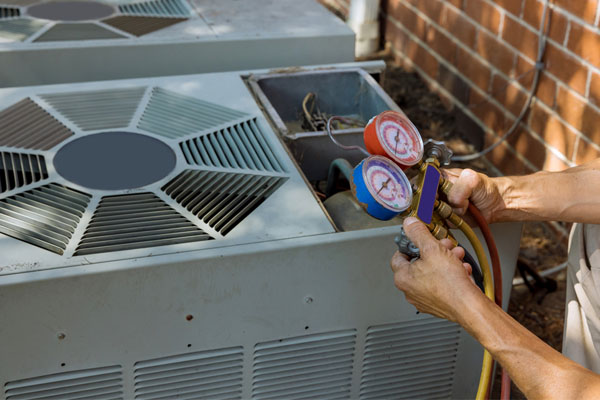 air conditioner maintenance by an hvac contractor