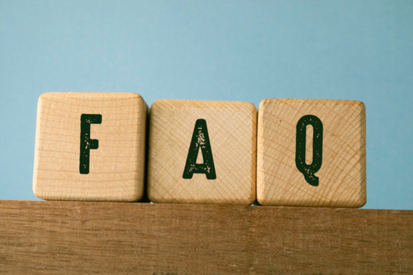 FAQ spelled using wooden letter cubes depicting Air Conditioning Health Effects questions