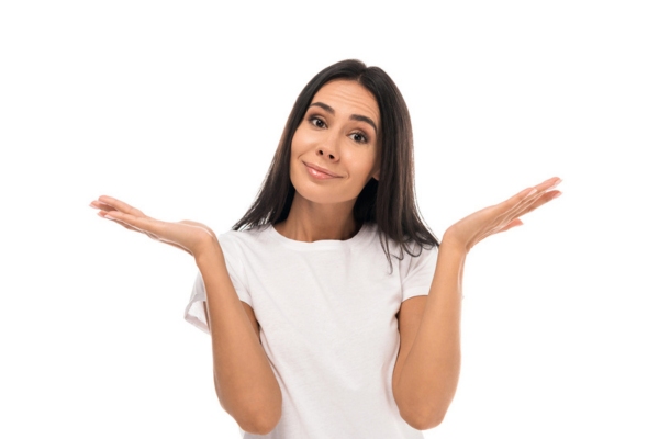 woman shrugging depicting how to approach Furnace Reset Button Issues