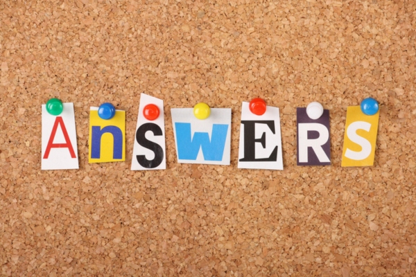 ANSWERS spelled using letter cutouts from magazines pinned on a corkboard depicting furnace noise common questions