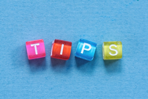 TIPS spelled using colorful cubes made of beads