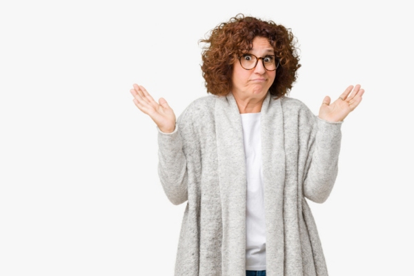 woman shrugging depicting What to Do When the Pilot Light Keeps Going Out