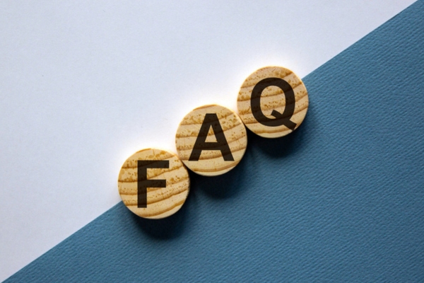 FAQ spelled using circular wooden letter chips depicting Heating Oil Tank Winter Preparation questions