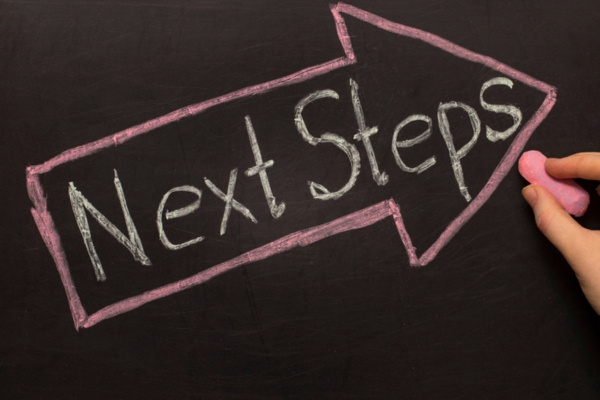 next steps written on a chalkboard depicting what to do when you have Rising Heating Bills concerns