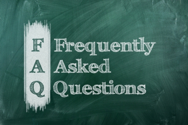 Frequently Asked Questions written on a chalkboard depicting Indoor Air Quality FAQs