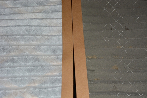 close up of clean and dirty air filters