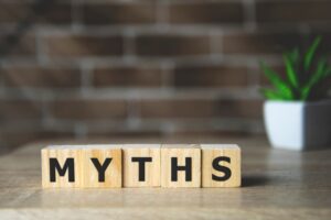 Myths word spelled using wooden letter cubes