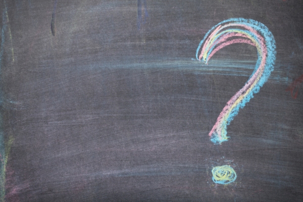 question mark on a chalkboard depicting What Temperature to Set Air Conditioner in Summer FAQs