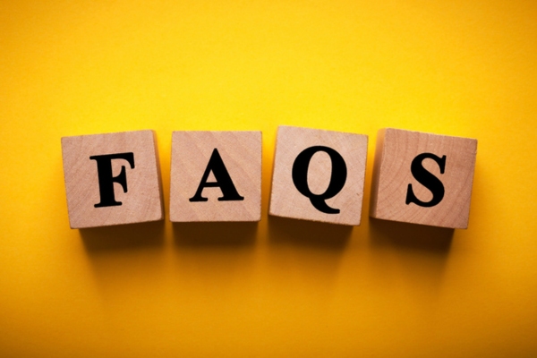 FAQS spelled using wooden letter chips depicting Portable Air Conditioner questions