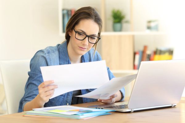 homeowner comparing heating oil and electric heating cost at home