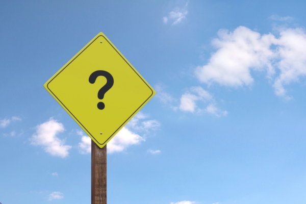 question mark on a yellow road sign depicting Modern HVAC Technology FAQs